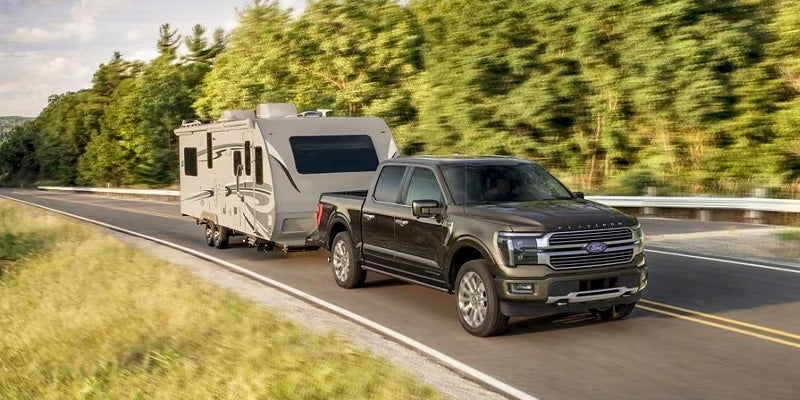 Truck towing RV on highway