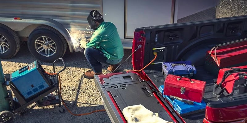 Raptor graphics on the side of a high-performance truck